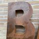 Bar sign in vintage metal letters