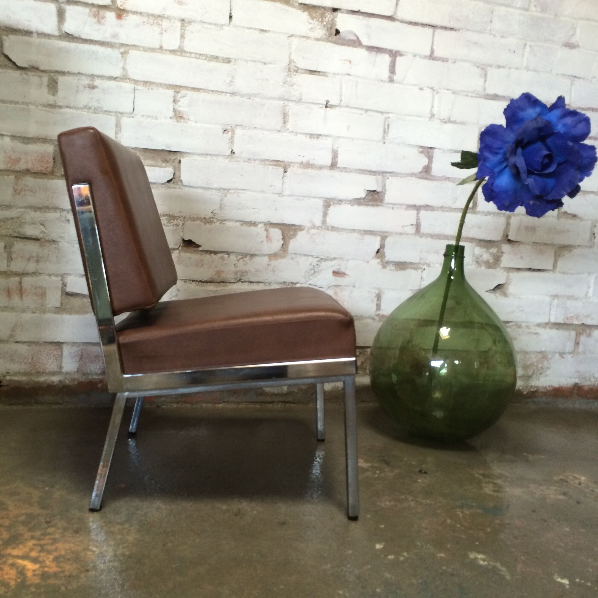 Modernist fireside chair / vintage chrome and skai armchair