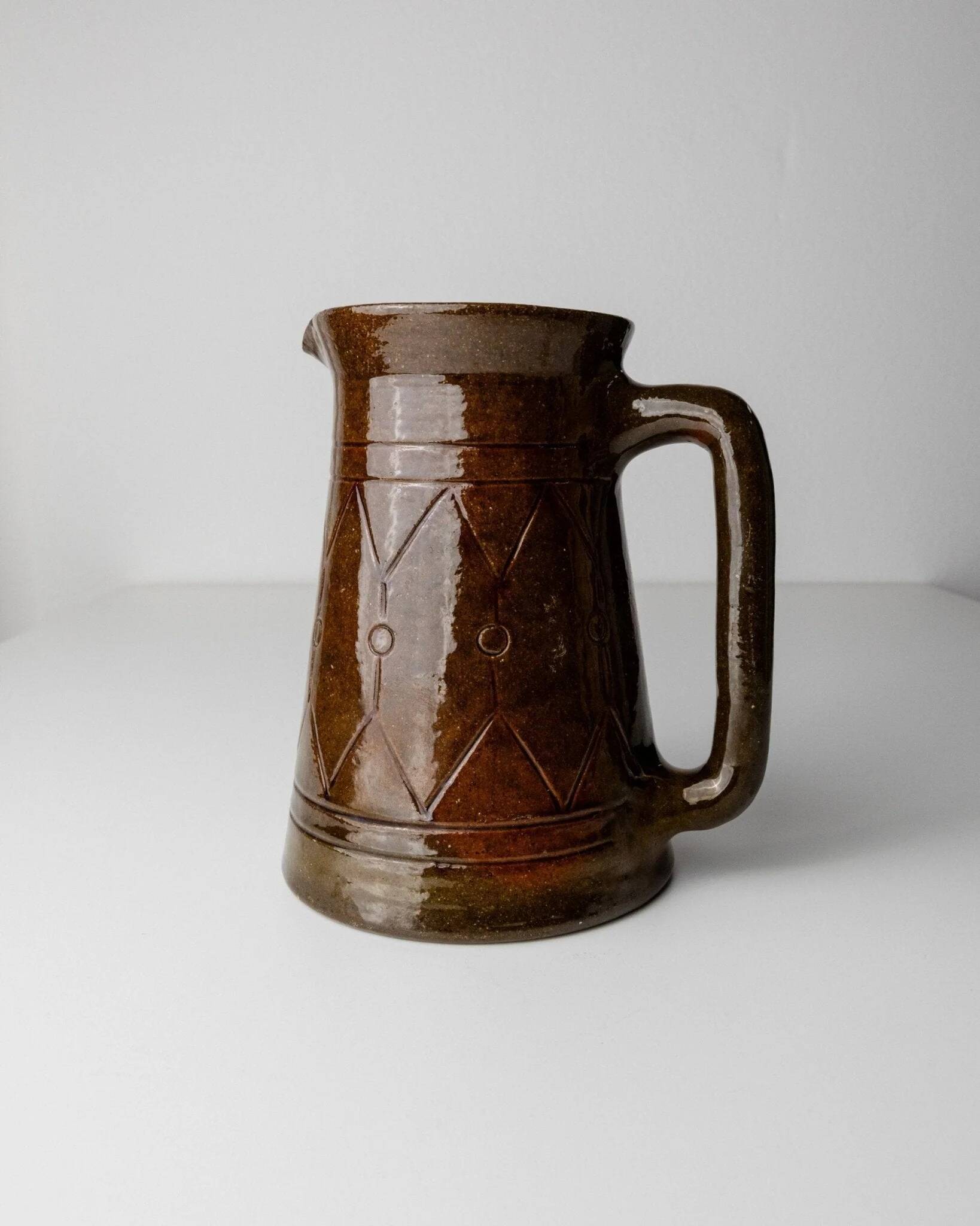 Vintage ceramic pitcher or vase with handle by Urbano Fontana, relief, brown glaze, Italy 1970s.