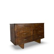 A vintage Italian chest of drawers, made of veneered walnut and solid wood,