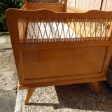 Vintage baby bed in rattan