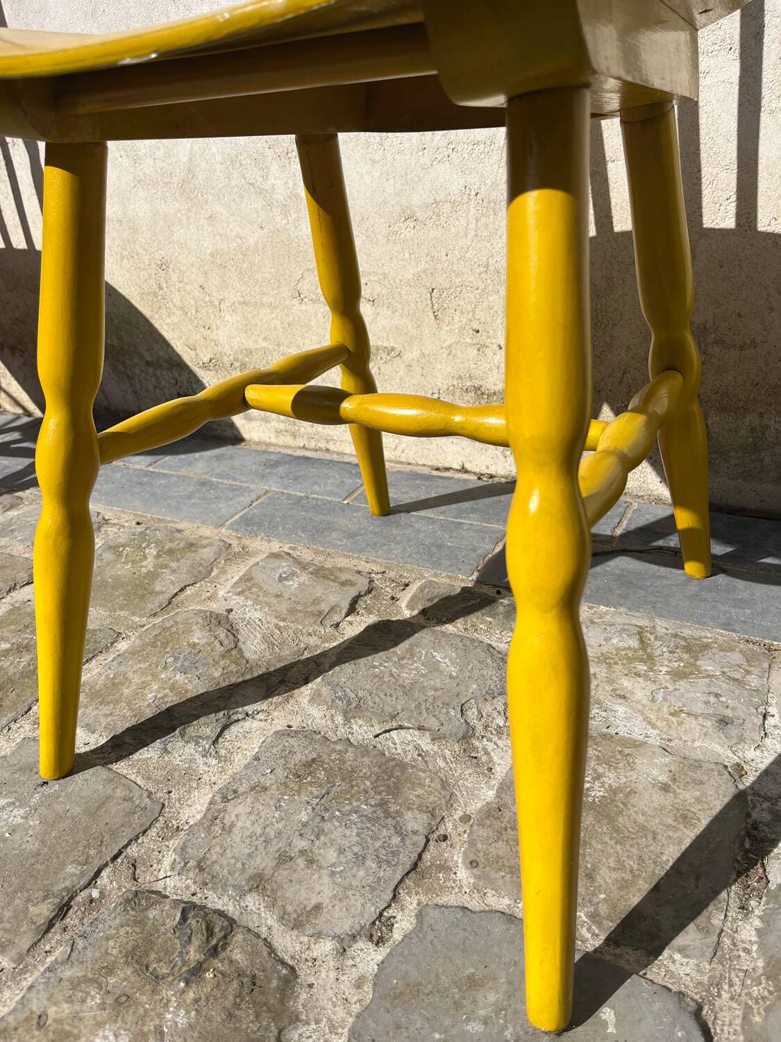 Mustard yellow Baumann chair
