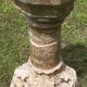 Holy water font on stone column (17th century)