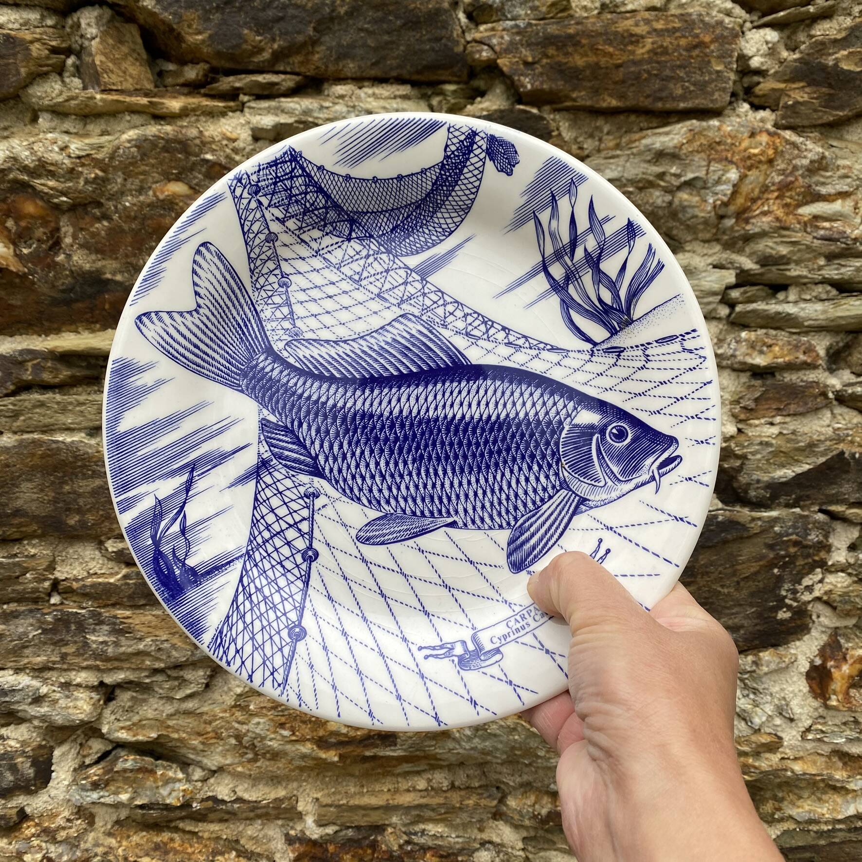 Plates and dish, fish service with cobalt blue decoration.