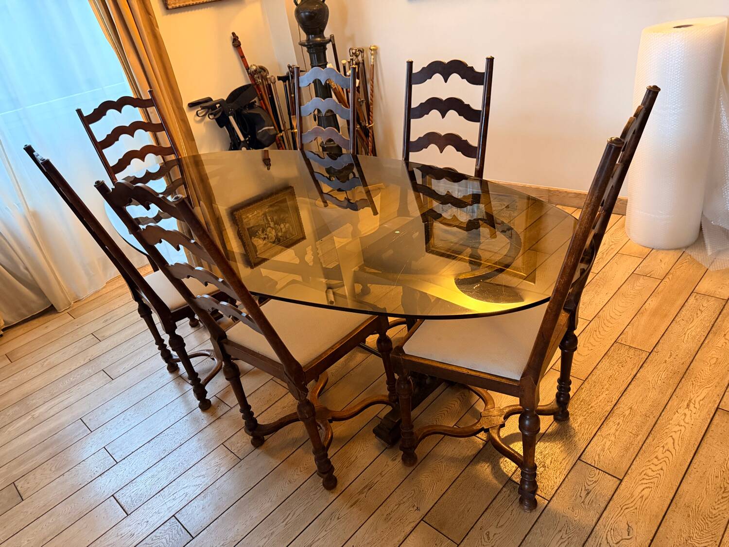 Large antique dining table in wrought iron and smoked glass,