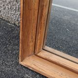 Square mirror in old wood