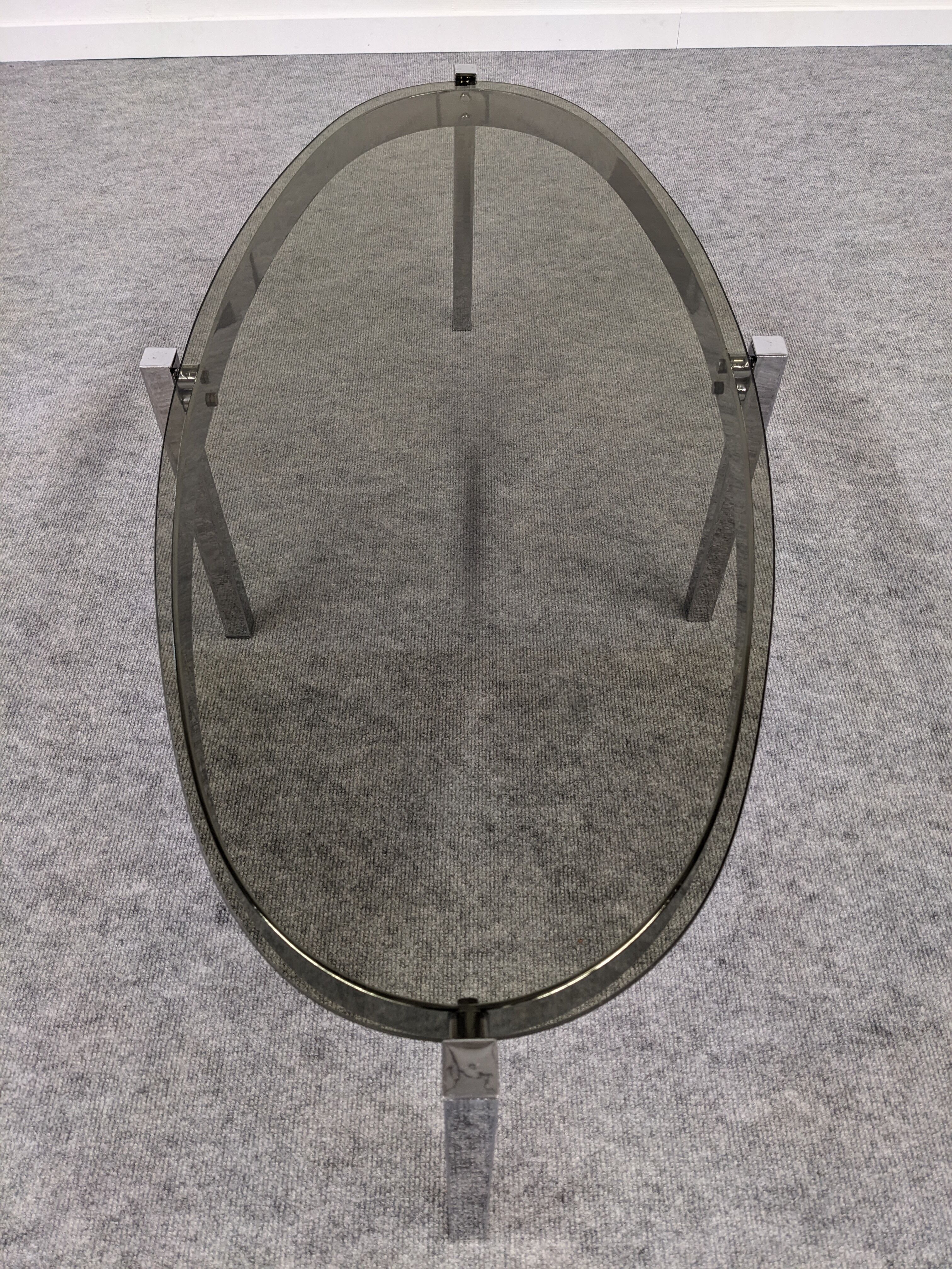 Oval smoked glass coffee table from the 60s/70s