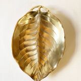 Brass pocket emptier