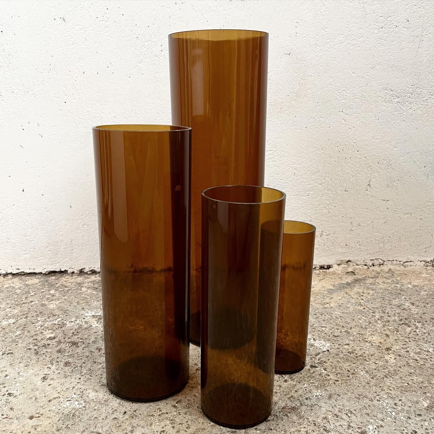 4 Jacques Bédat trundle vases in smoked plexiglass