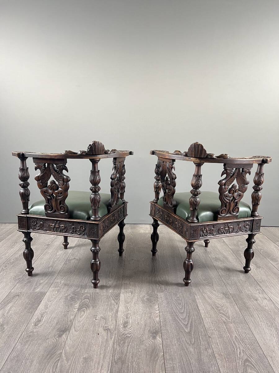 Pair of corner armchairs in carved wood, 19th century