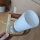 Pair of Louis Kalff NX40 teak and glass wall lights for Philips
