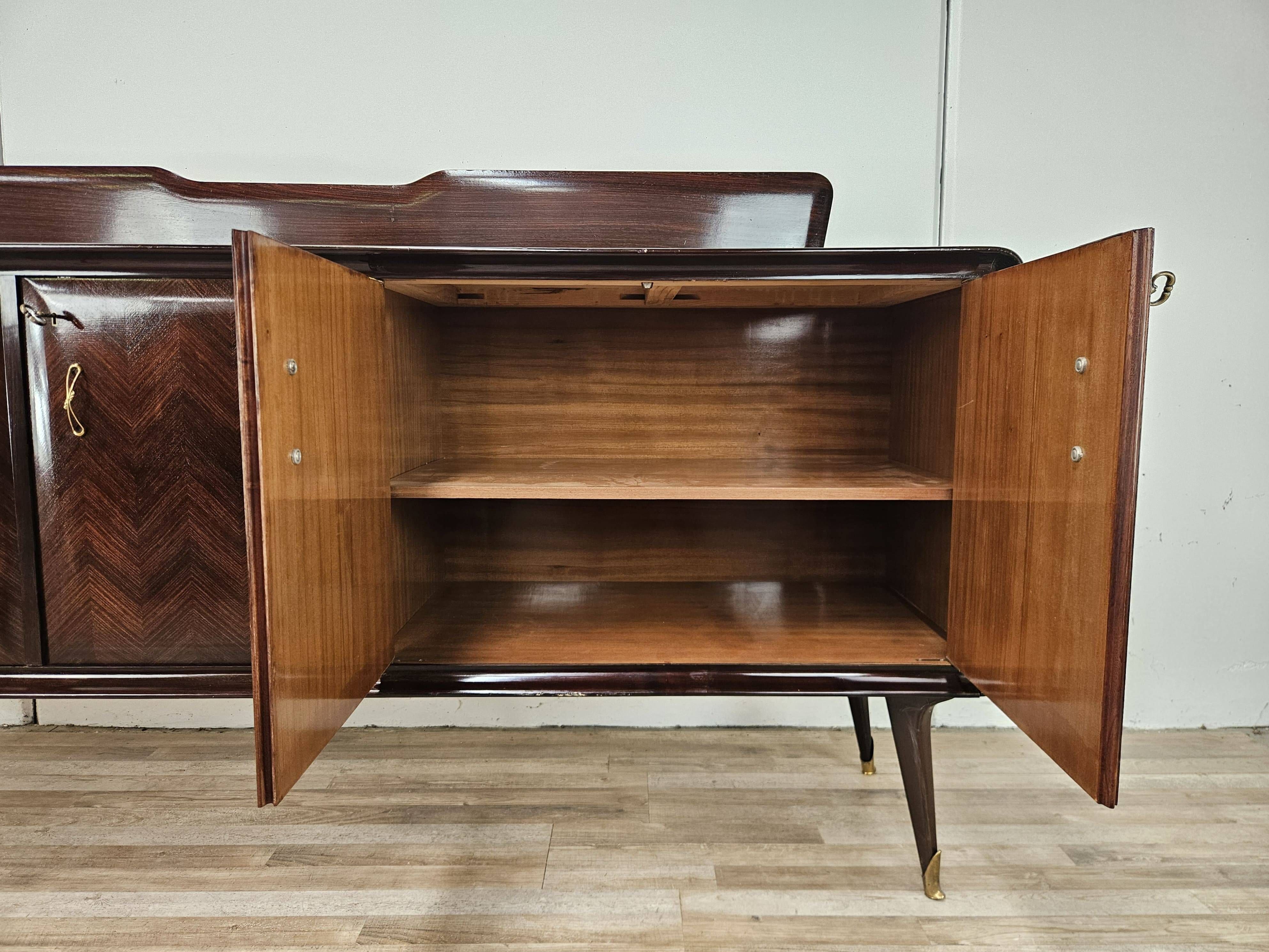 Mahogany sideboard with a glass top, 1960