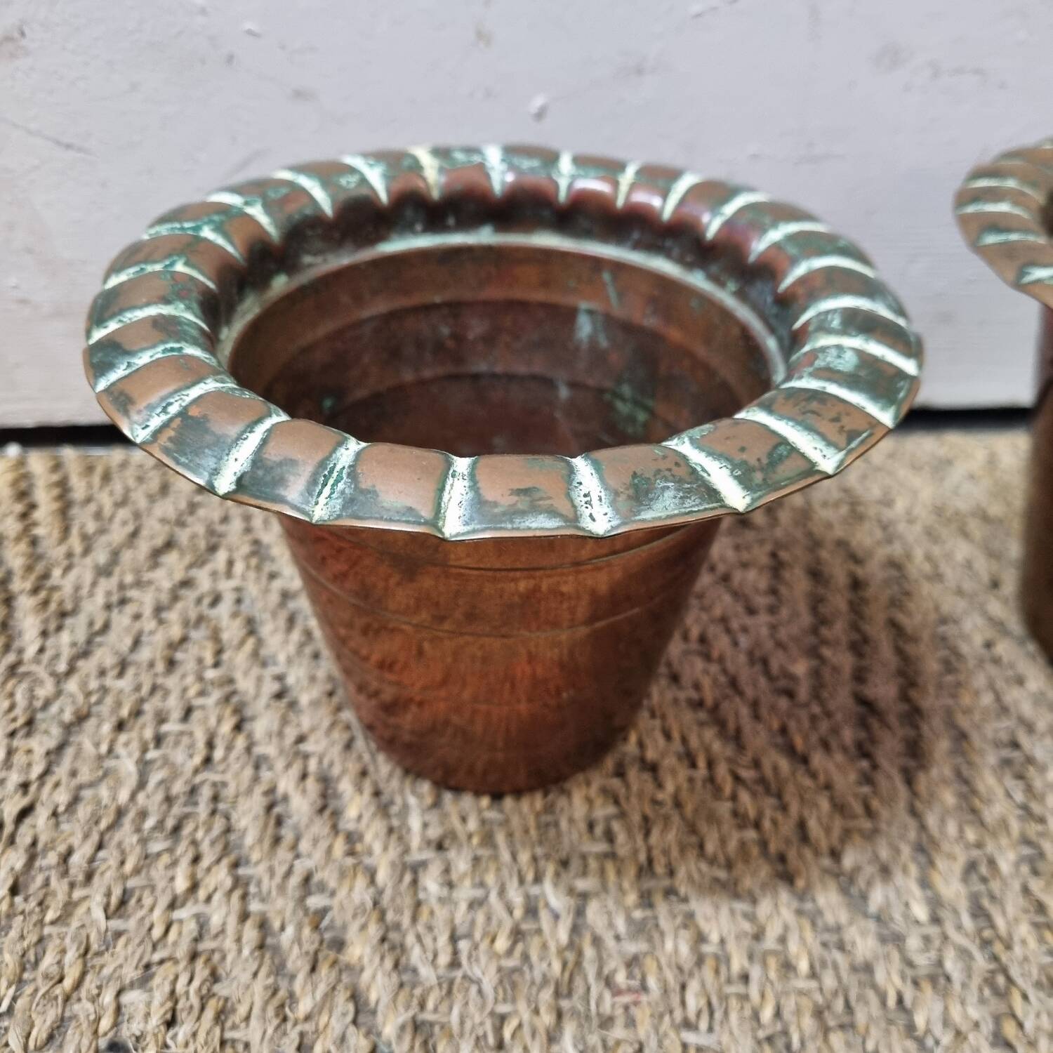 2 copper pot covers, 1960