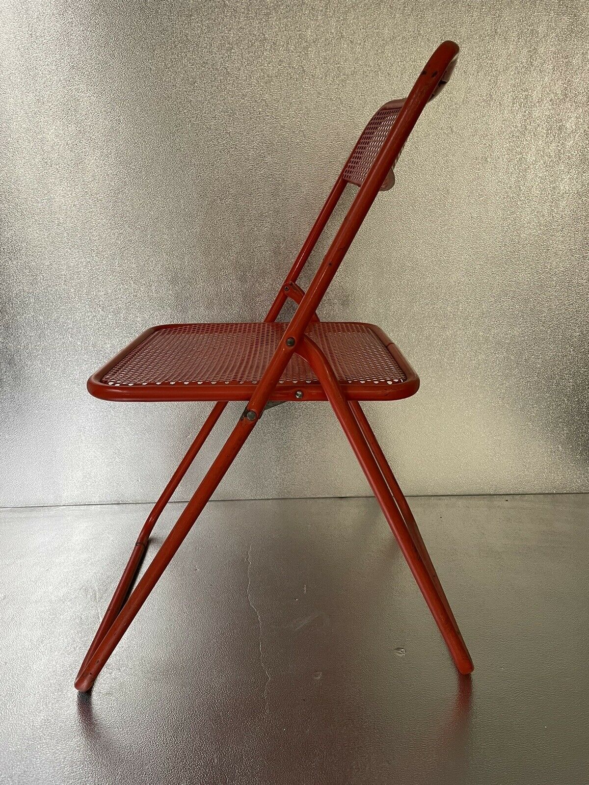 Old folding chair metal perforated red 60s, 70s, vintage