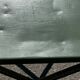 Folding garden or bistro table in khaki sheet metal from the early 1950s.