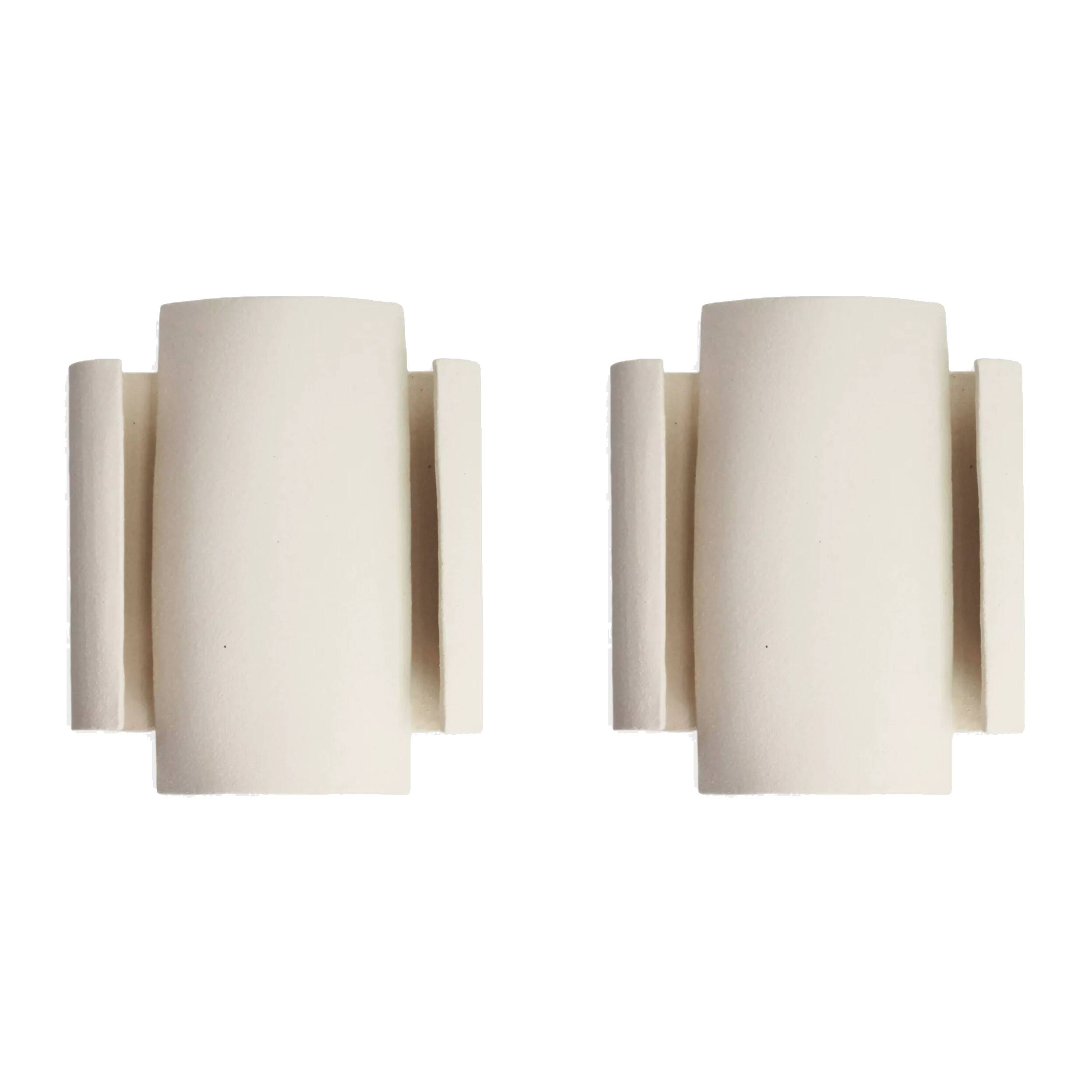 Set of two white TILE wall lights.