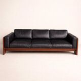 Three-seater leather and rosewood canapé Bastiano by Tobia Scarpa.