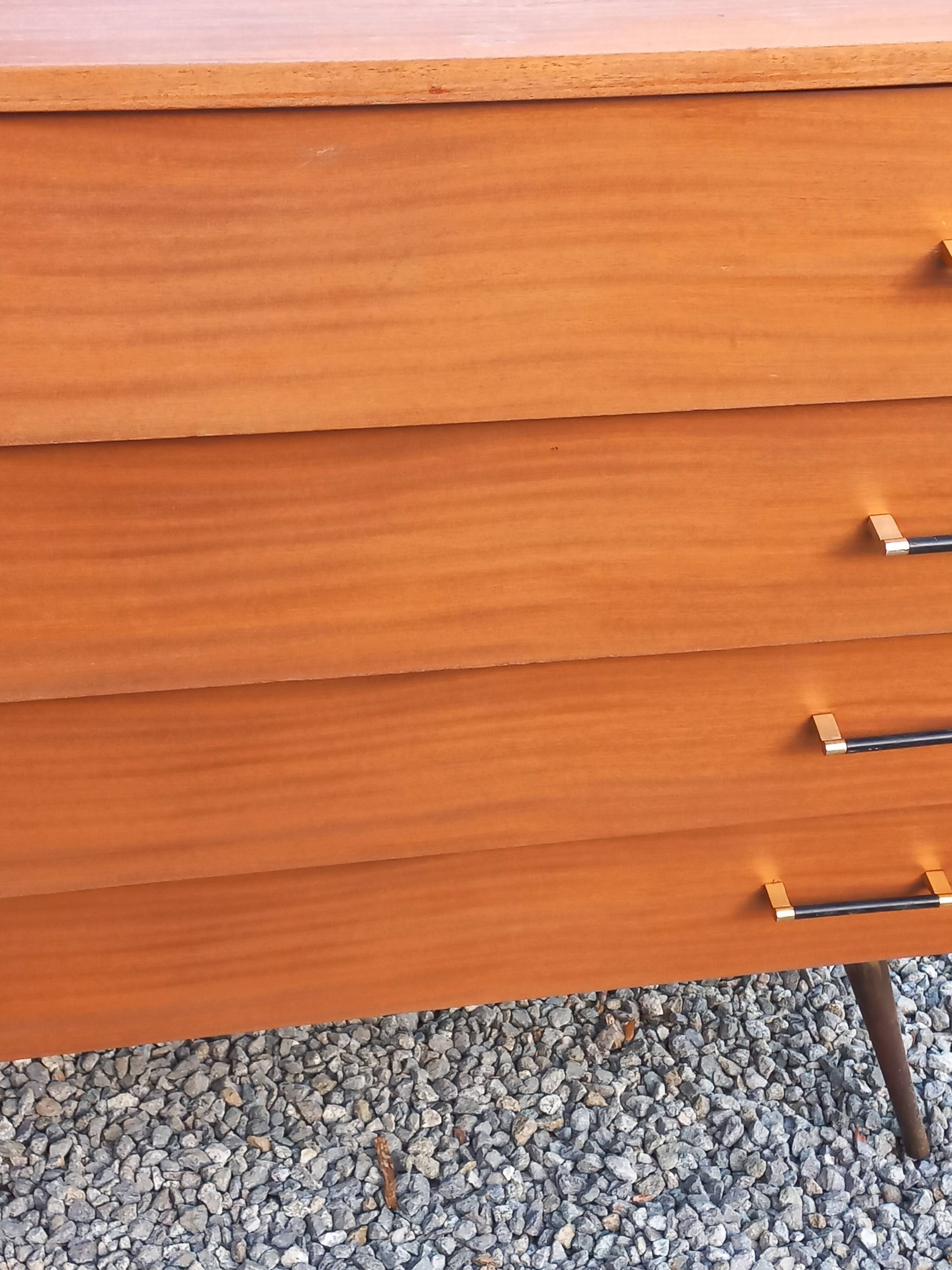 Vintage mahogany commode with metal tapered legs, 4 drawers, 1950s.