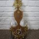 Pair of patinated wood sconces