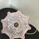 Suspension vintage opaline rose mouchetée et laiton
