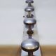 Retro vintage coat rack with 4 aluminum hooks on a wooden frame
