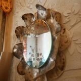 Sun mirror with mother-of-pearl circumference