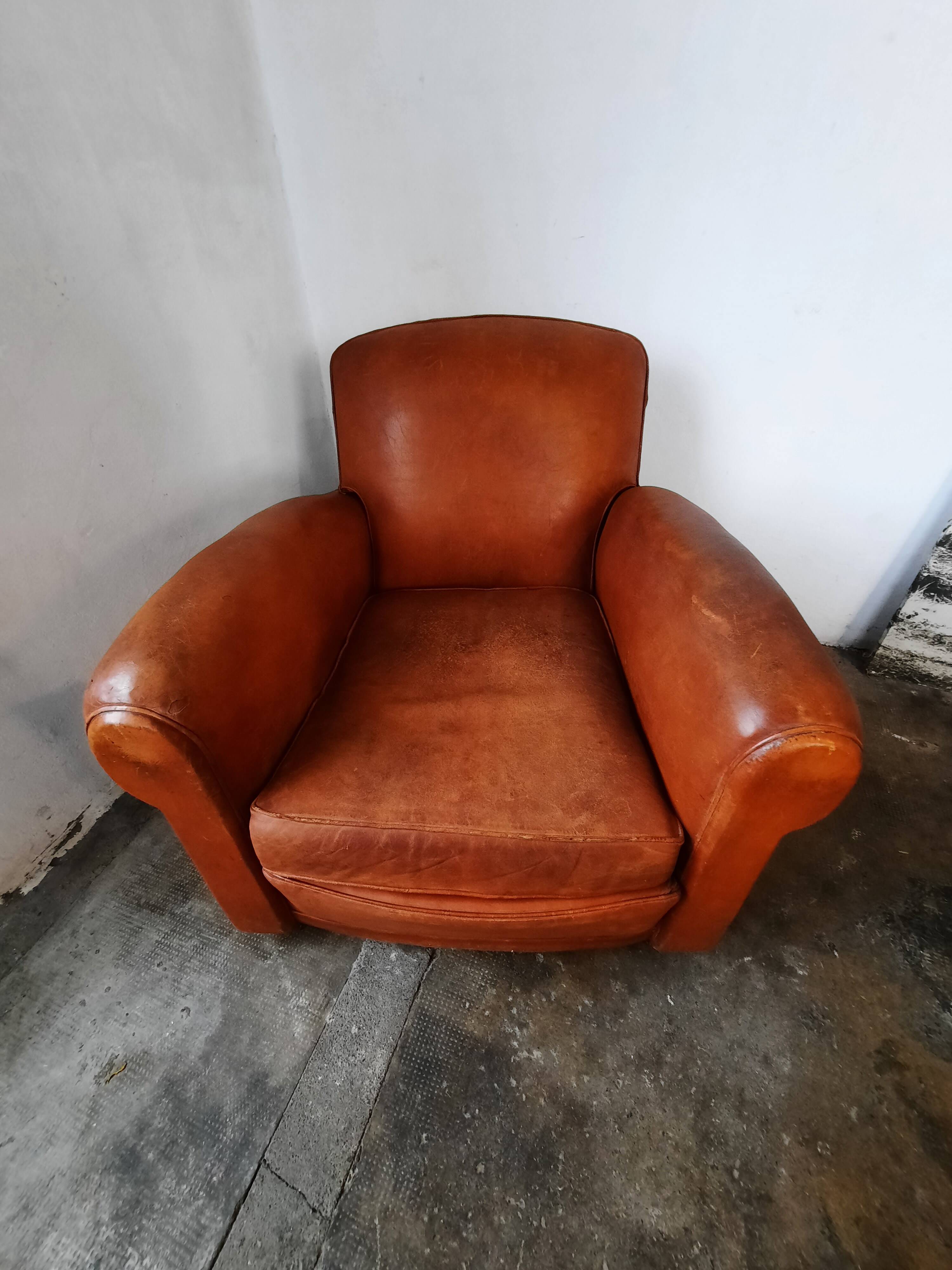 Old leather club chair 1940-1950