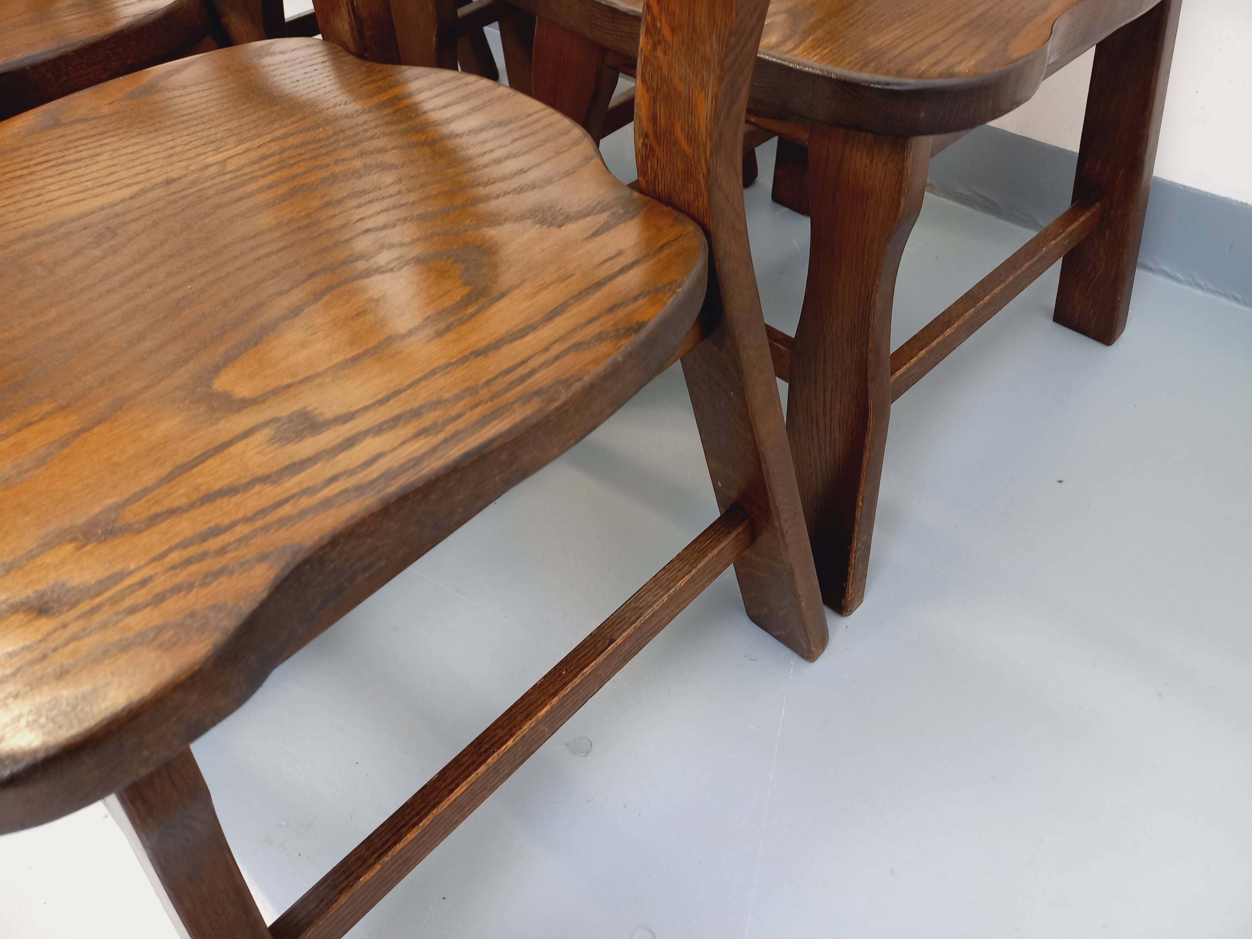 Set of 6 vintage brutalist oak chairs from the 1950s.