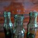 Lot de 5 bouteilles anciennes en verre vert olive