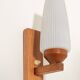 Pair of teak and opaline glass wall lamps, 1950s/1960s