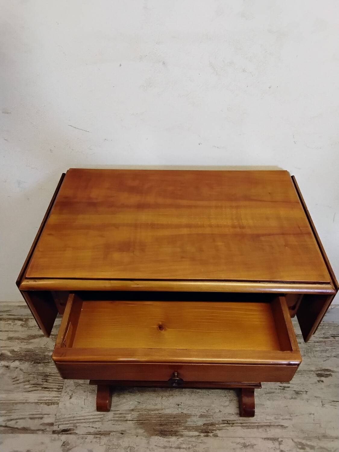 Small wooden drop-leaf table