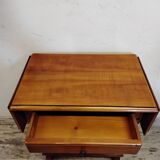 Small wooden drop-leaf table
