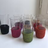 set of 9 small glasses with colored rattan support from the 70s