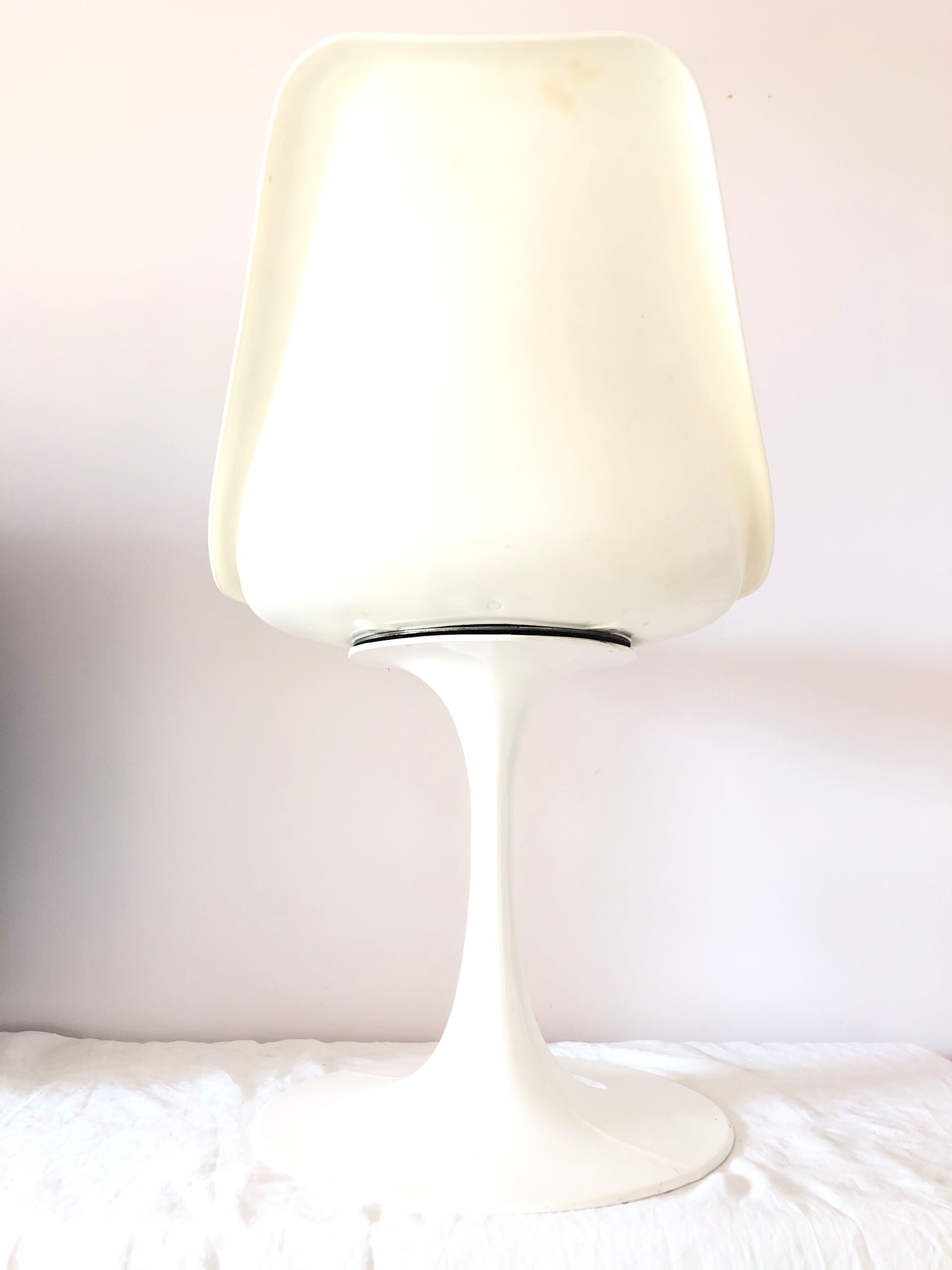 Pair of vintage tulip foot swivel chairs