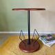 Wooden side table with magazine rack