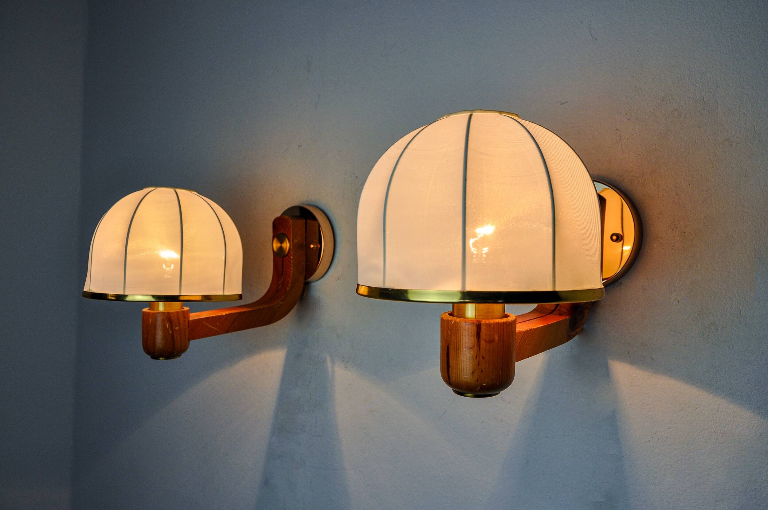Pair of regency wall lights, pine and stretched canvas, Italy, 1970