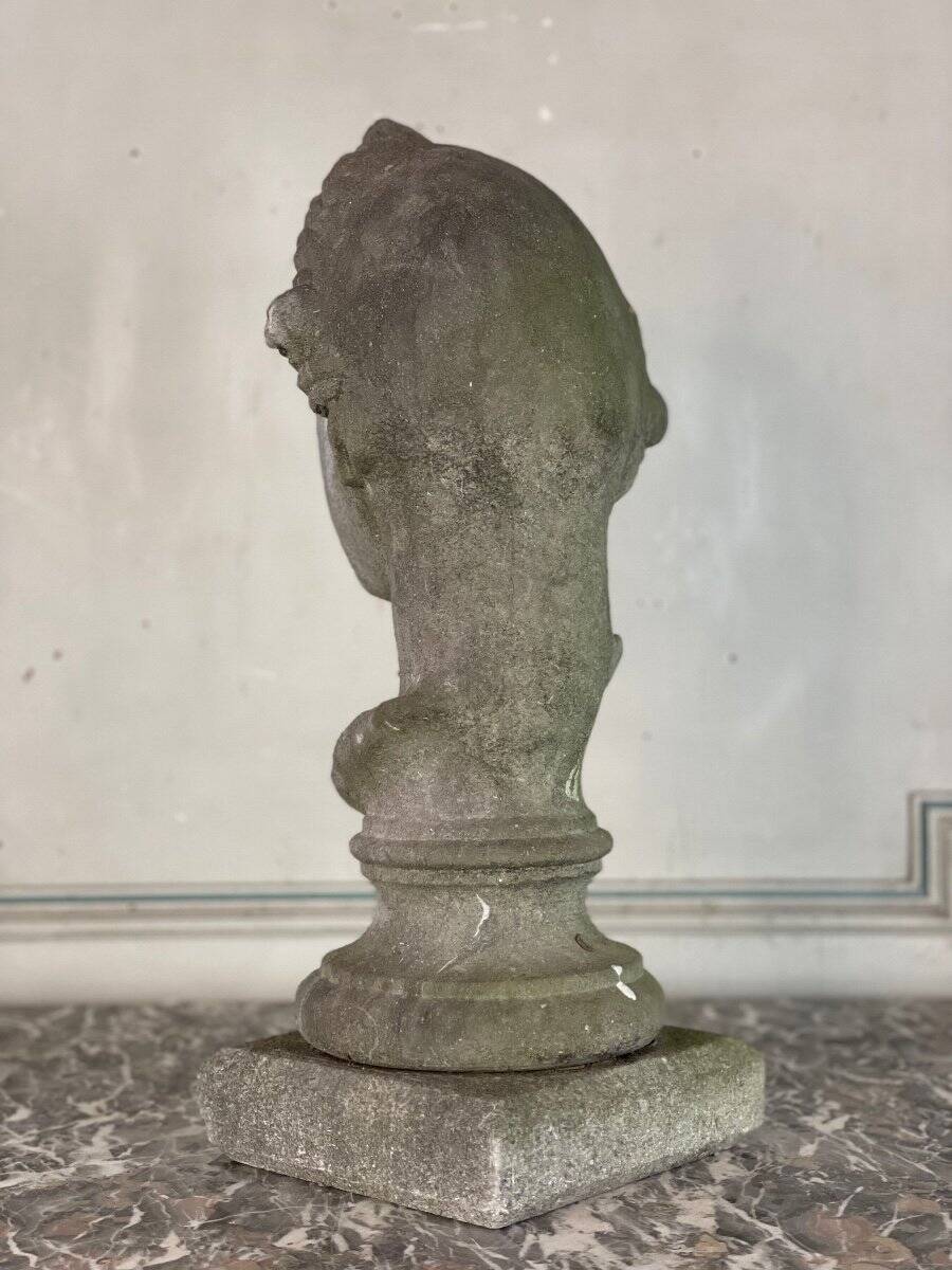 Female bust sculpted in stone