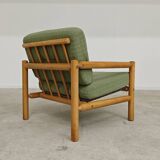 Pair of chalet style armchairs in green fabric