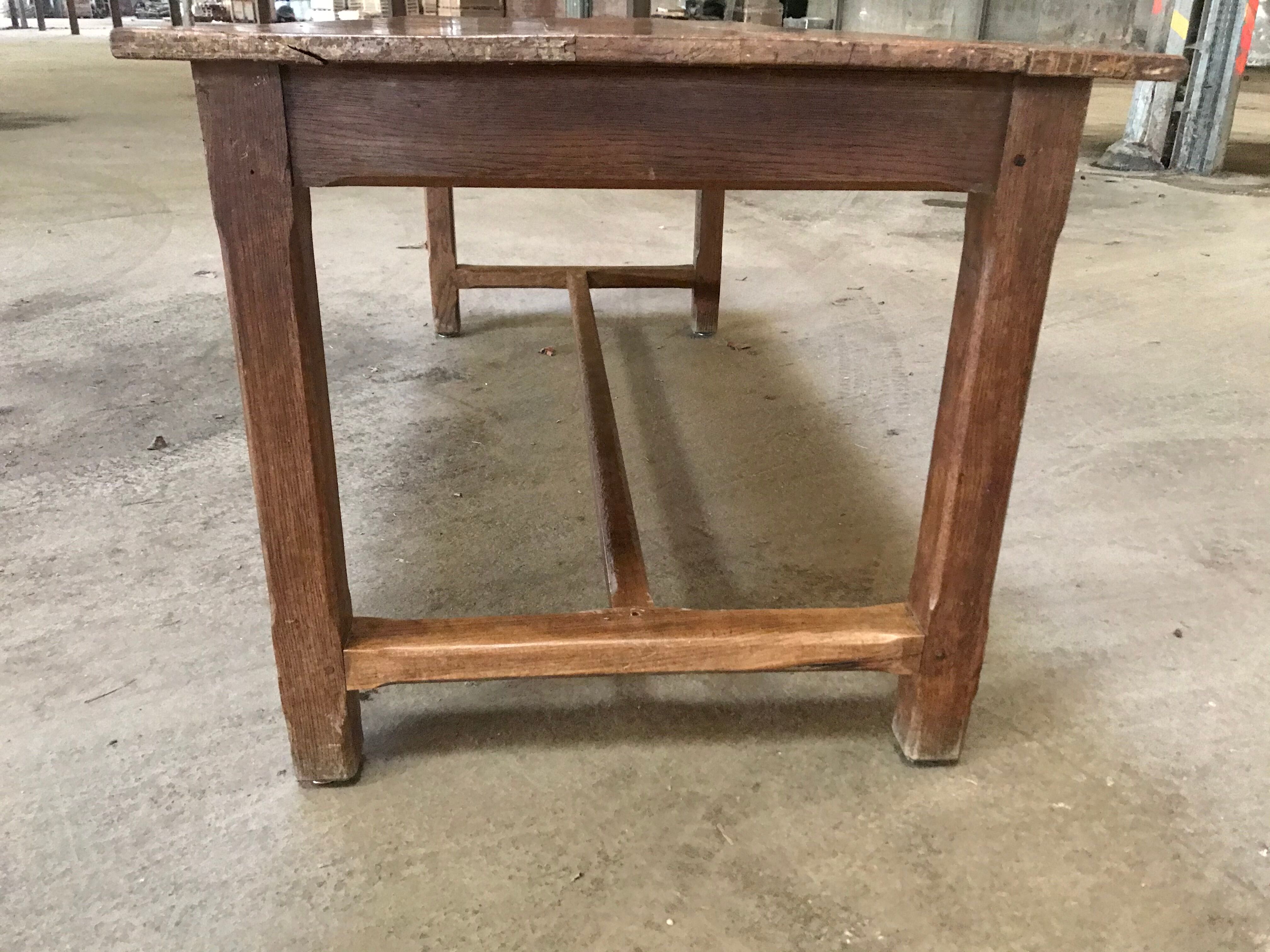 Old oak farm table in crisscross
