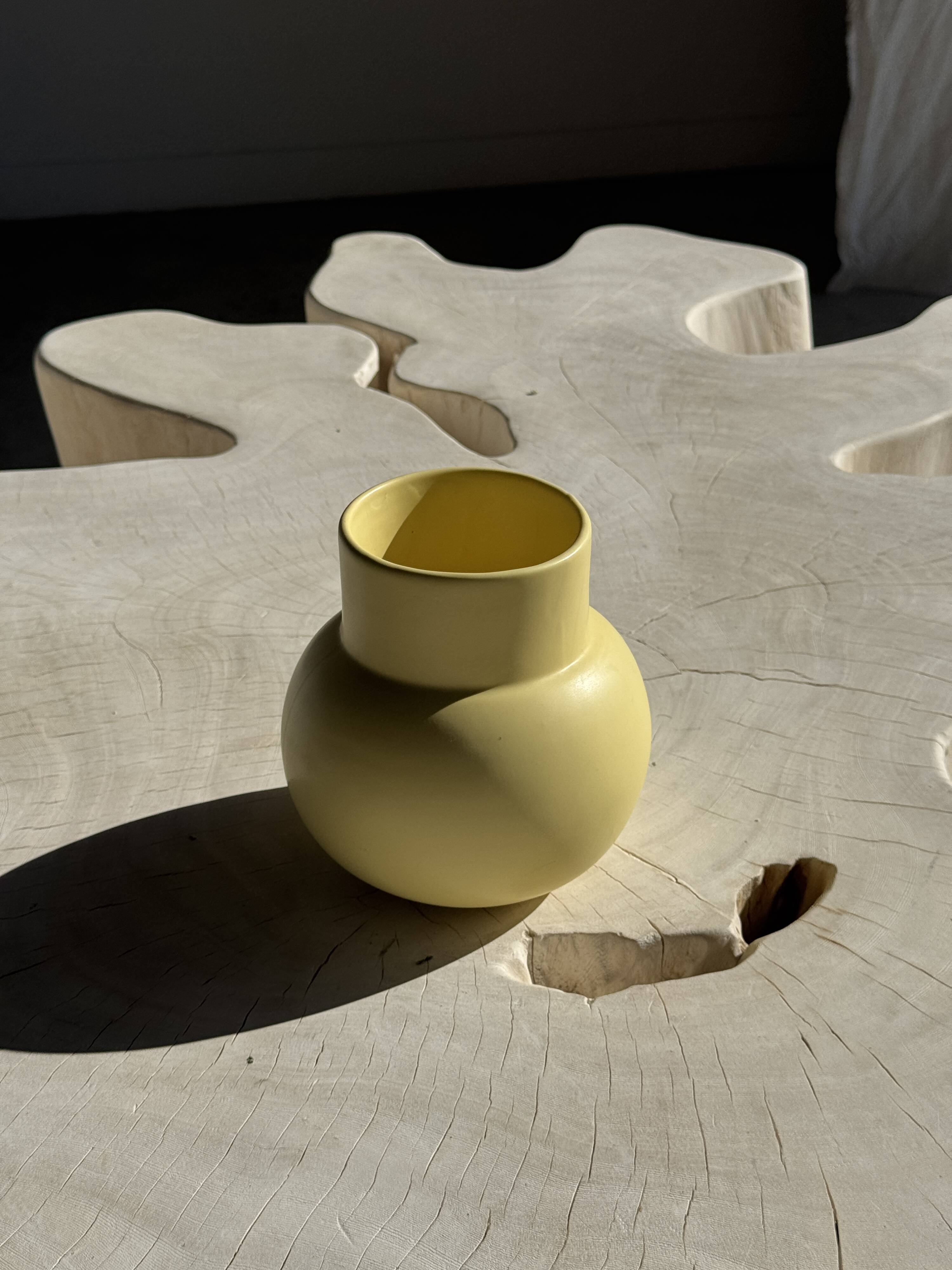 Small light yellow ball vase