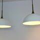Paire de suspensions en laiton et verre opale blanc par Florian Schulz