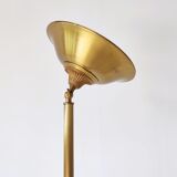 Halogen floor lamp in golden brass