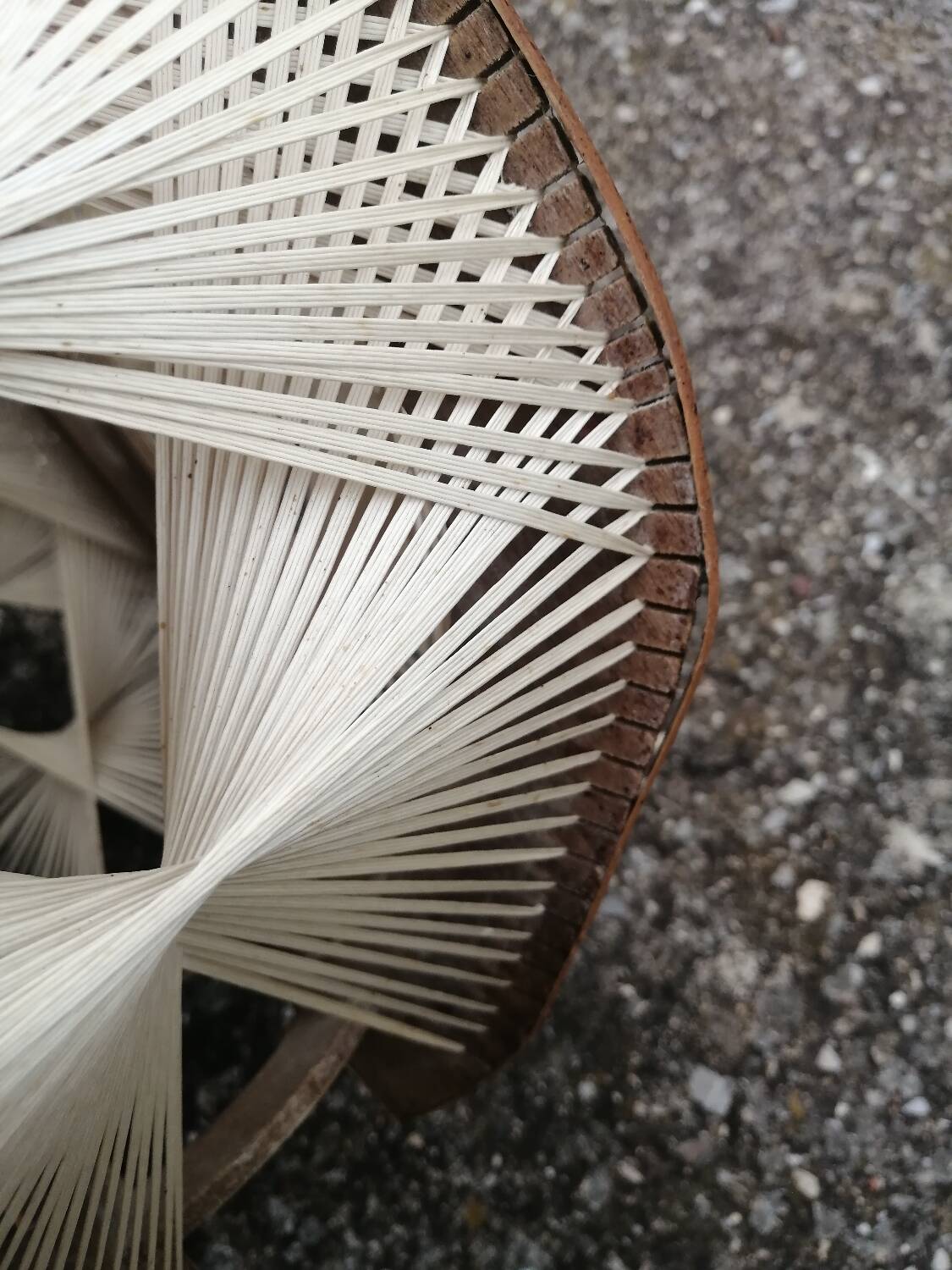 Pair of vintage wooden and rattan straw pendant lights.