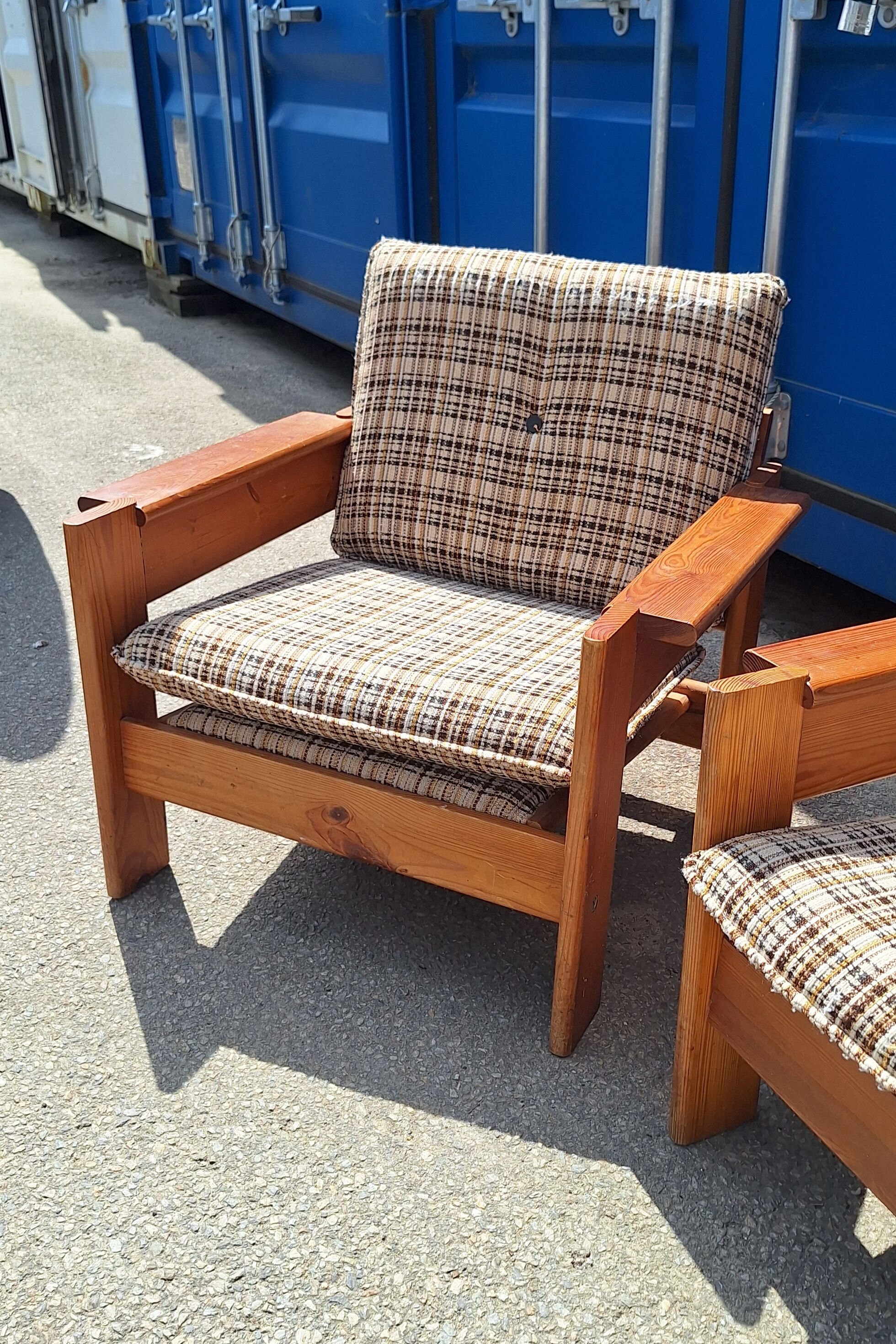 Brutalist-style bench and armchairs in 1970s pine.