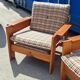 Brutalist-style bench and armchairs in 1970s pine.