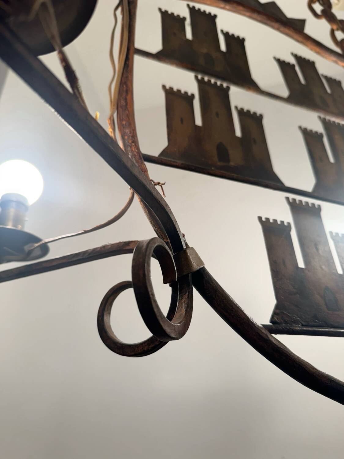 Medieval style heraldic wrought iron chandelier