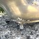 Footed pewter champagne cooler on claw feet with floral relief