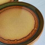 Six vintage stoneware plates with green net