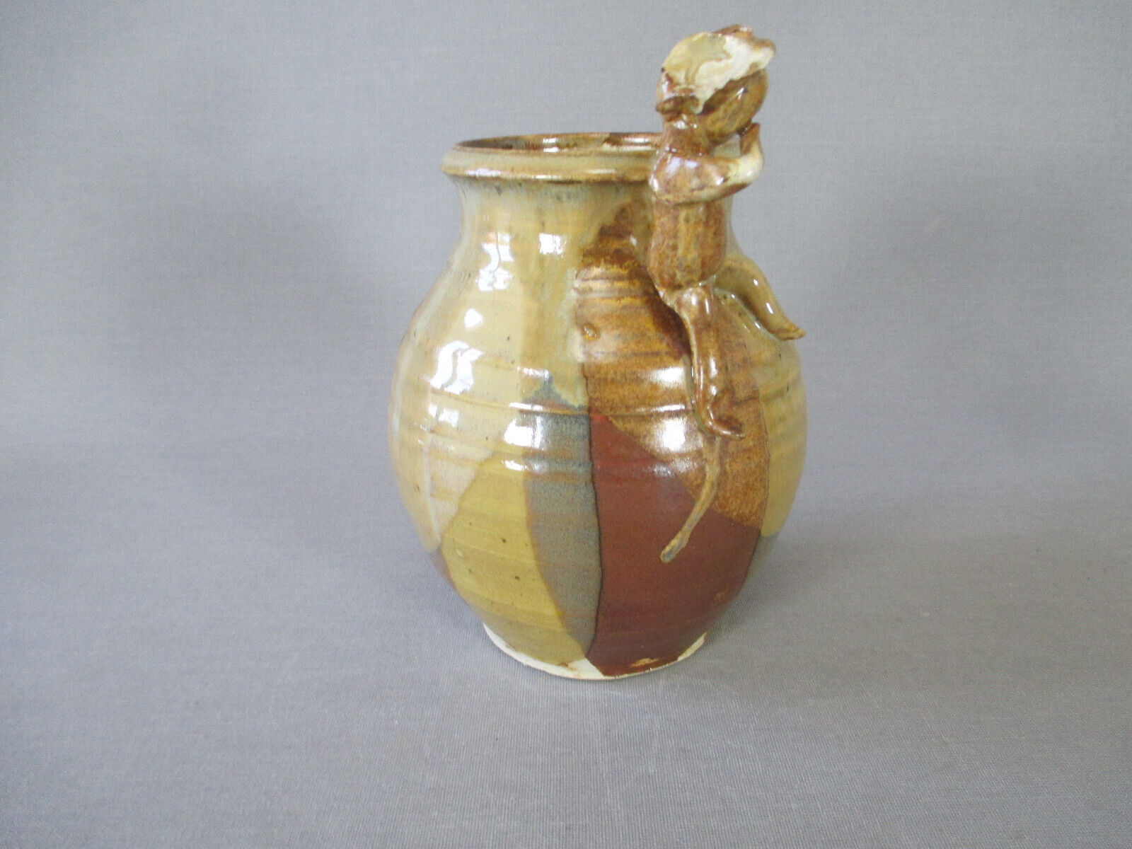 Signed anthropomorphic sandstone vase to be identified