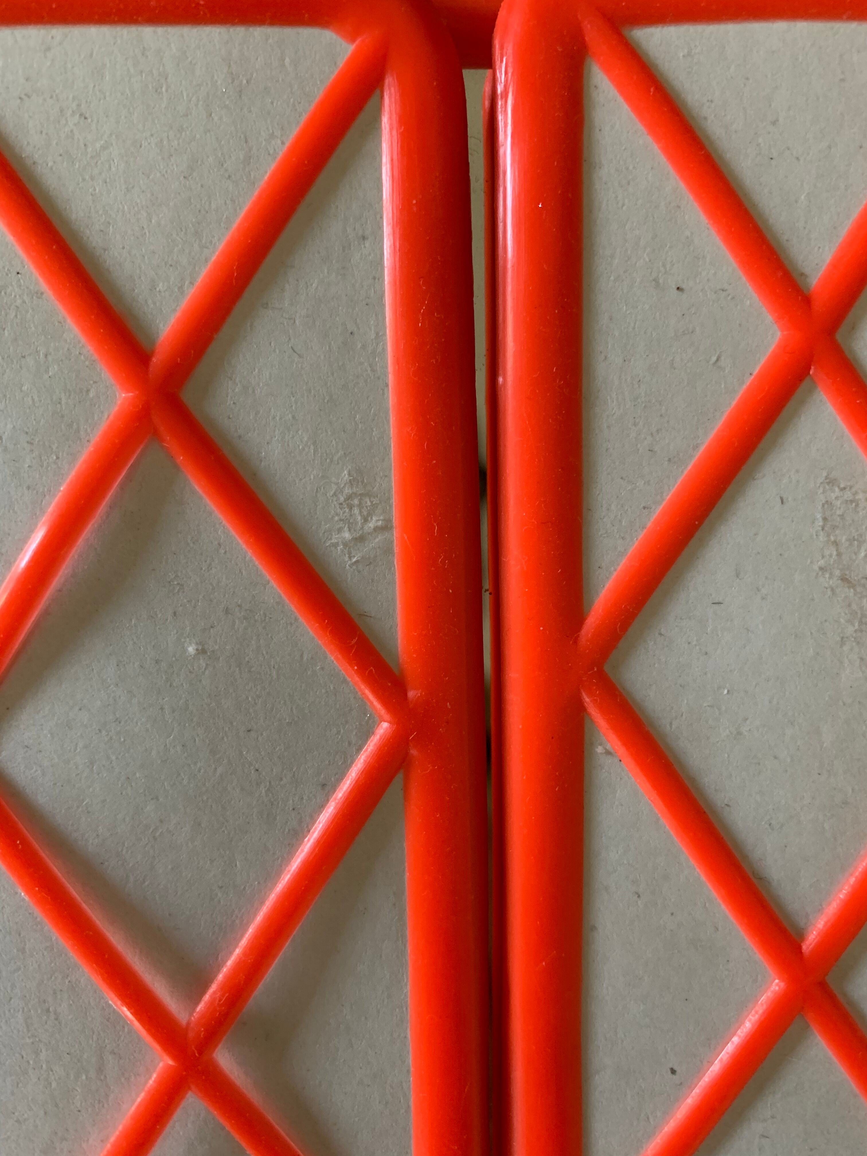 Orange plastic triptych mirror